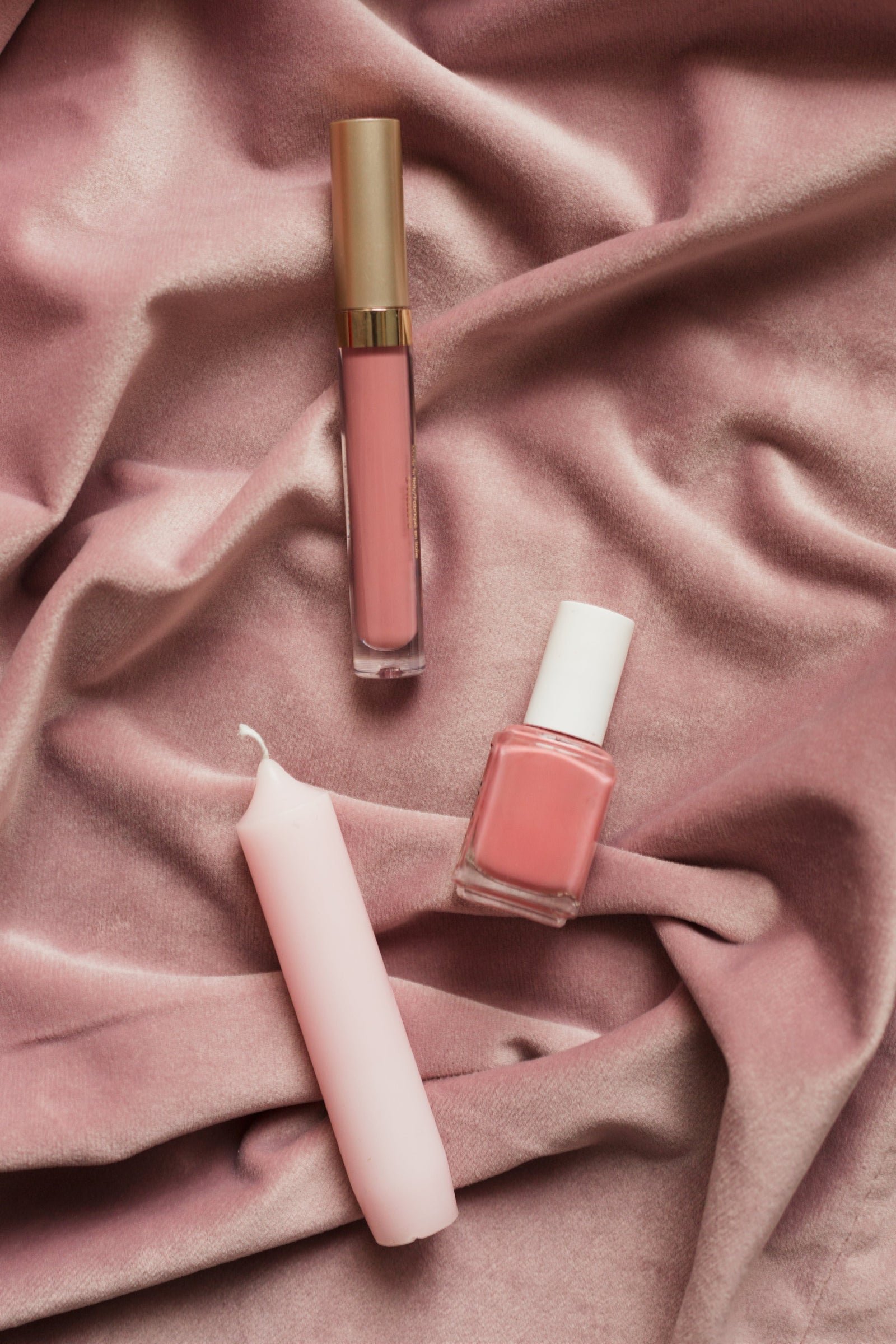 Blush makeup and candles